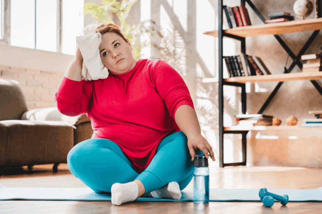 Woman Sweating After Workout