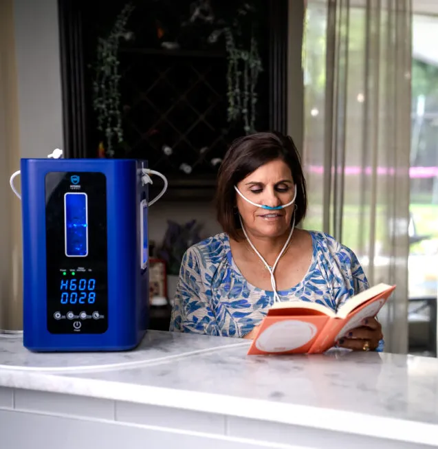 Woman using Hydrogen Therapy at Home